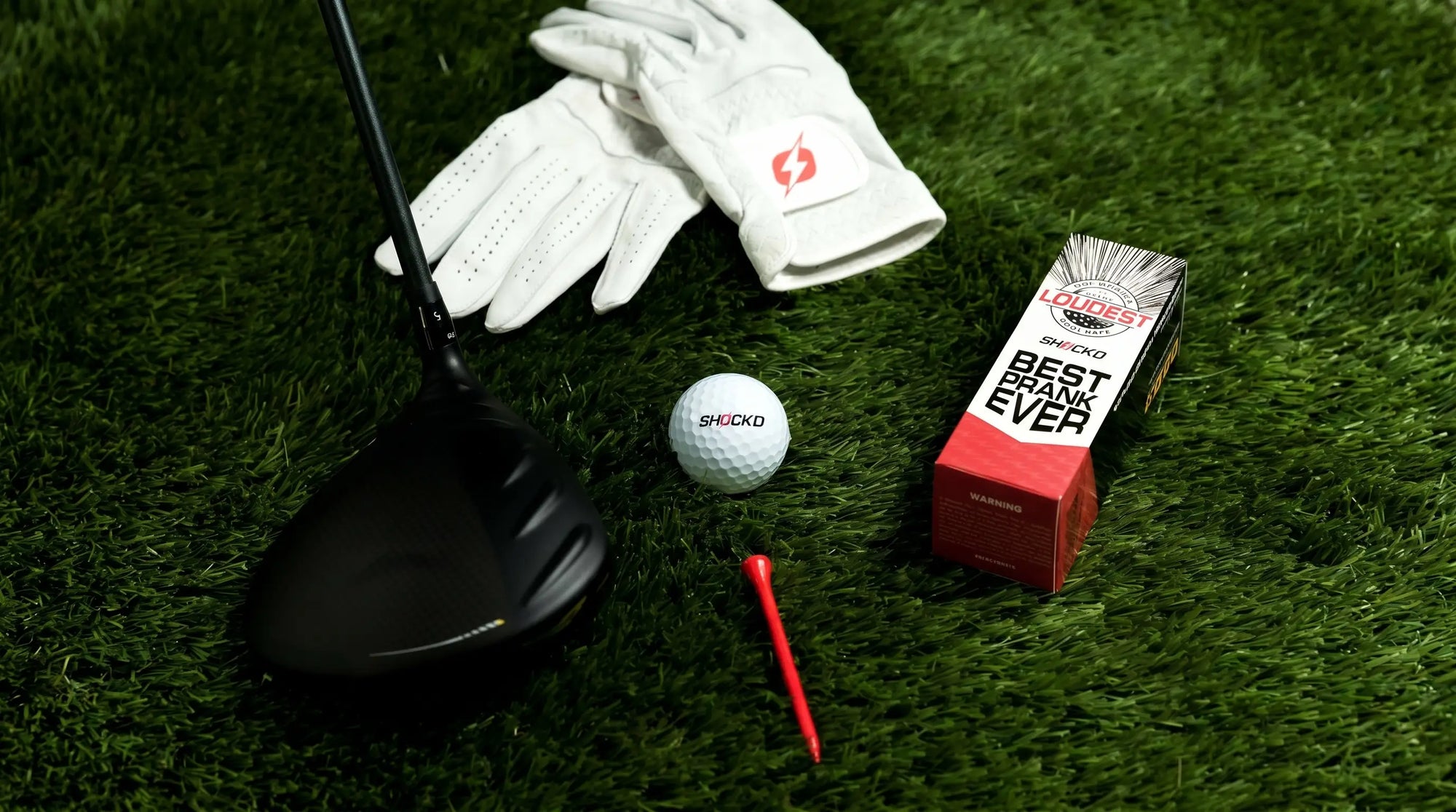SHOCK'D golf ball on the tee
